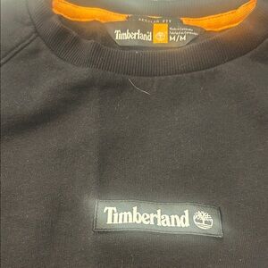 Timberland Black Crewneck Sweater with Orange Accent